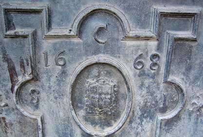 Closer view of embelishments on English lead cistern
