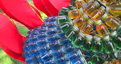 Colored water bottles make a dragon horse