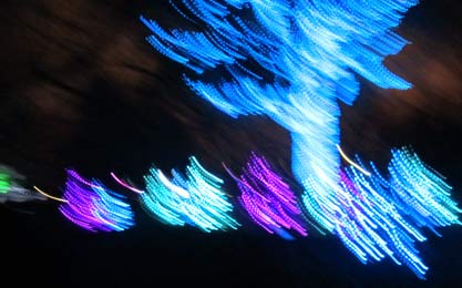 Blur of LED lights at opening of Garden Glow outdoor light display, Missouri Botanical Garden
